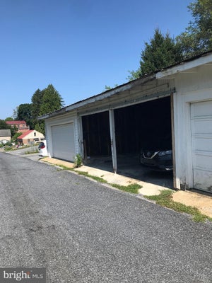 Rear parking and garage at 60 East Main Street