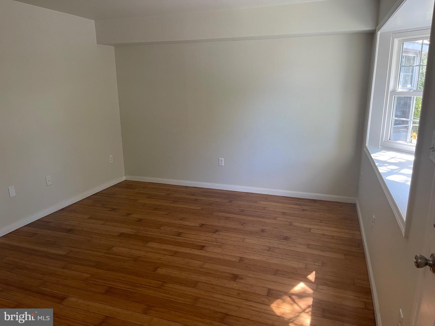 Room with hardwood floors at 1338 Blue Jay Drive